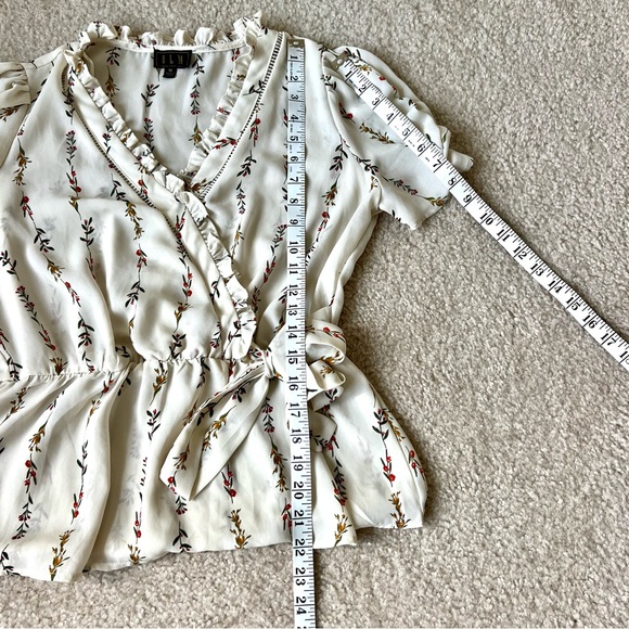 OLM Floral Ruffled Surplice Short Sleeve Peplum Blouse—SZ. Medium - Picture 13 of 16